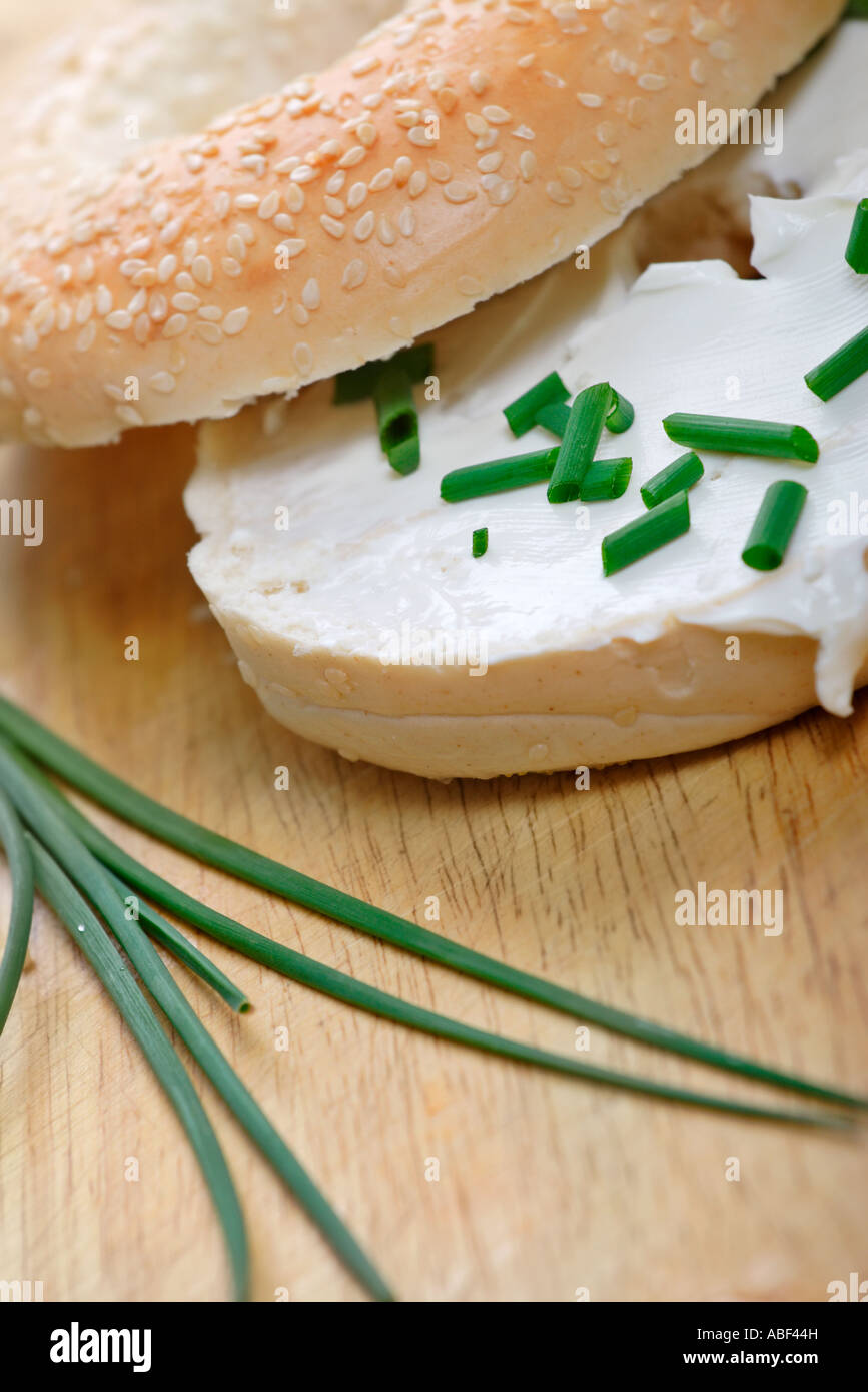 bagel with cream cheese and freshly cut chives Stock Photo Alamy