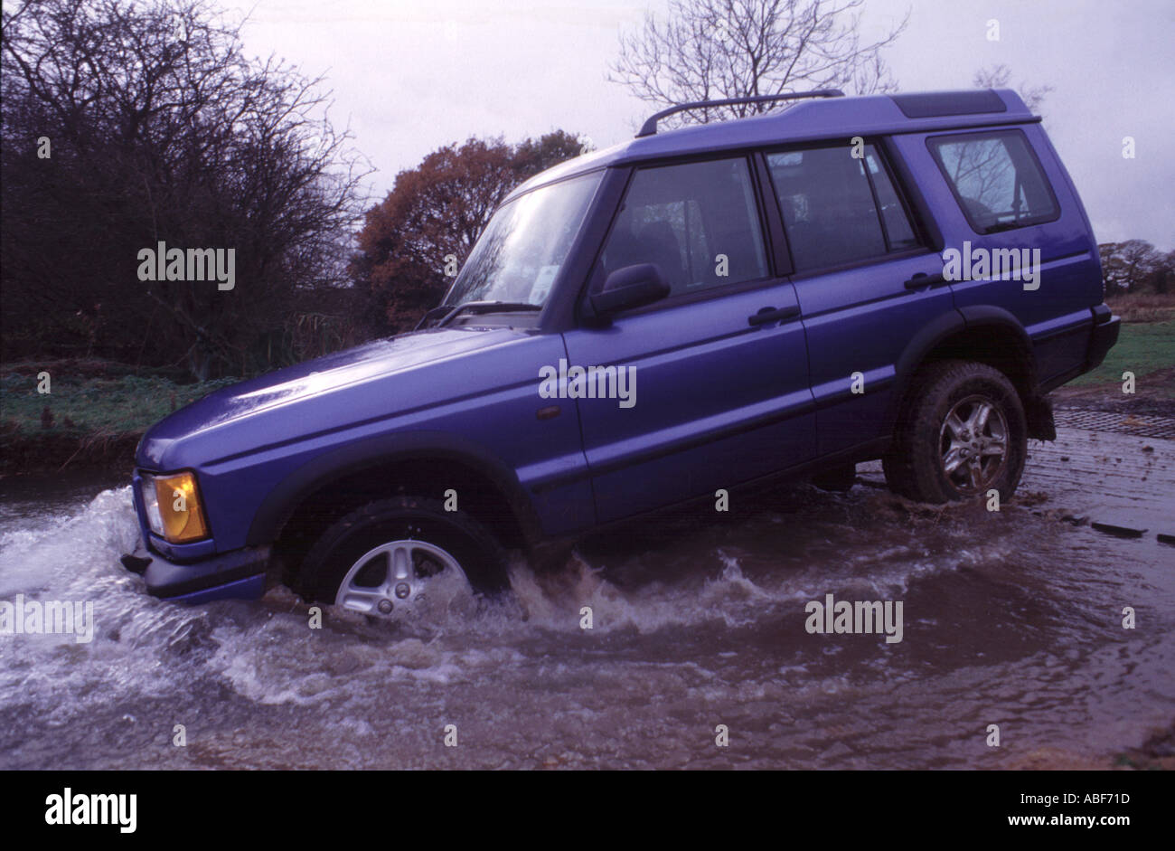 Range Rover in water Stock Photo - Alamy