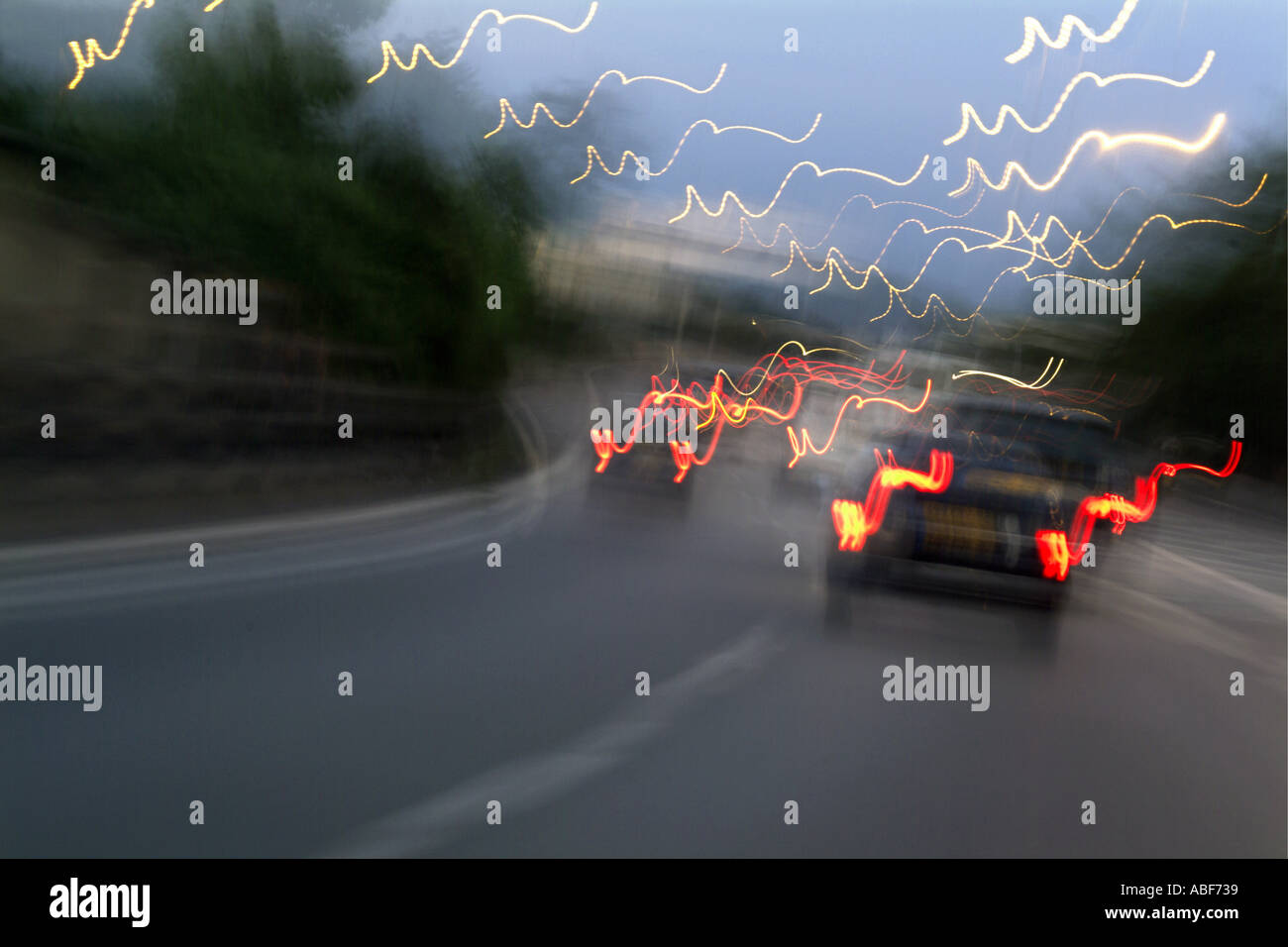 Cars moving on a highway as seen through a blurred windscreen, Paris ...