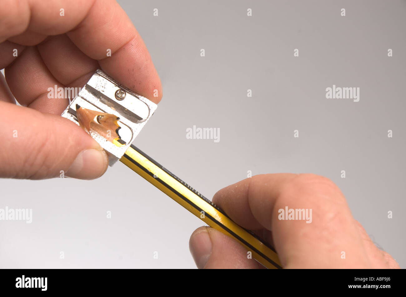 to sharpen a pencil Stock Photo