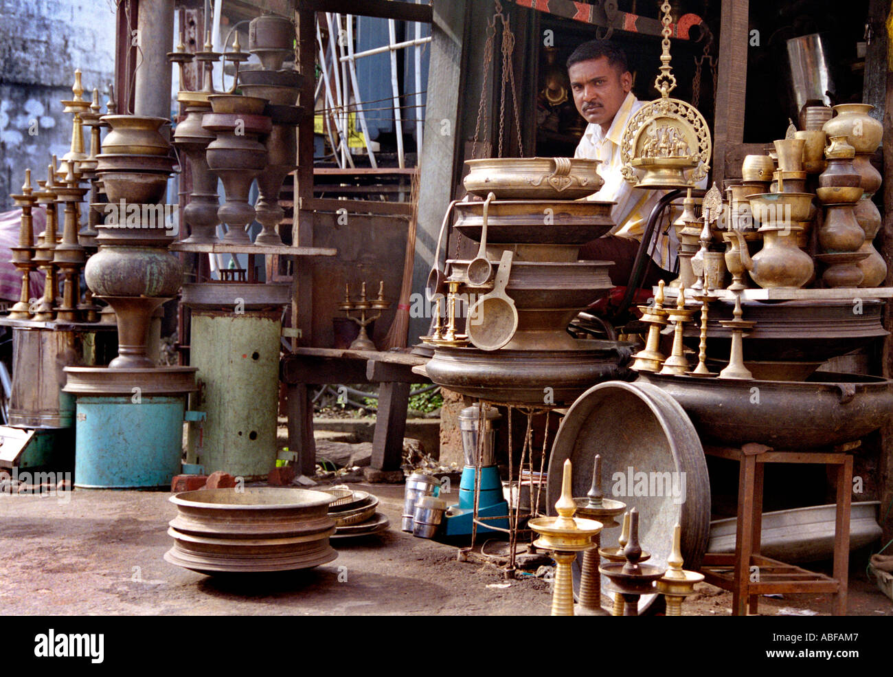 A young thirty year old man in an antique shop in Calicut Kerala Stock
