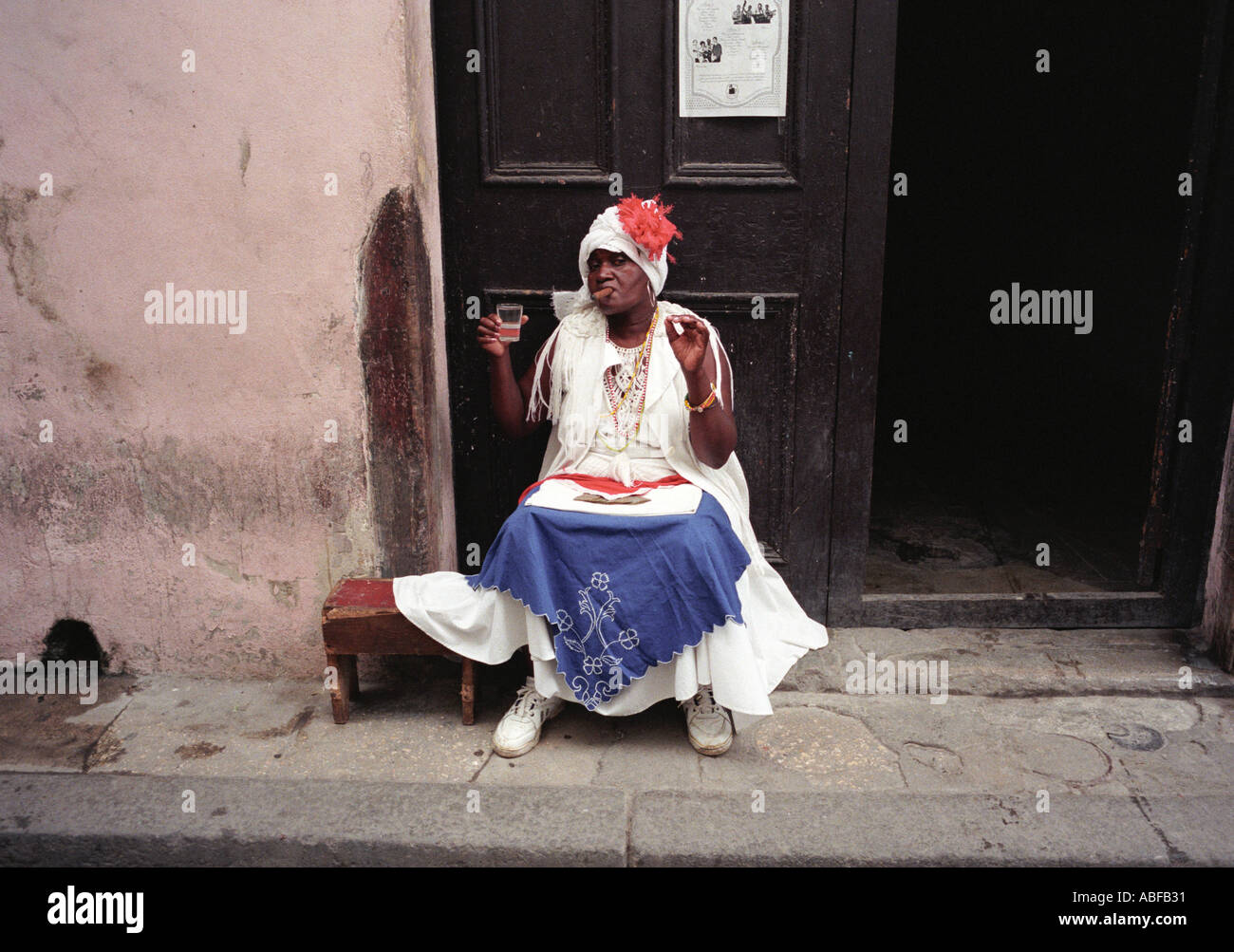 A rum drinking cigar smoking woman Havan Cuba Stock Photo