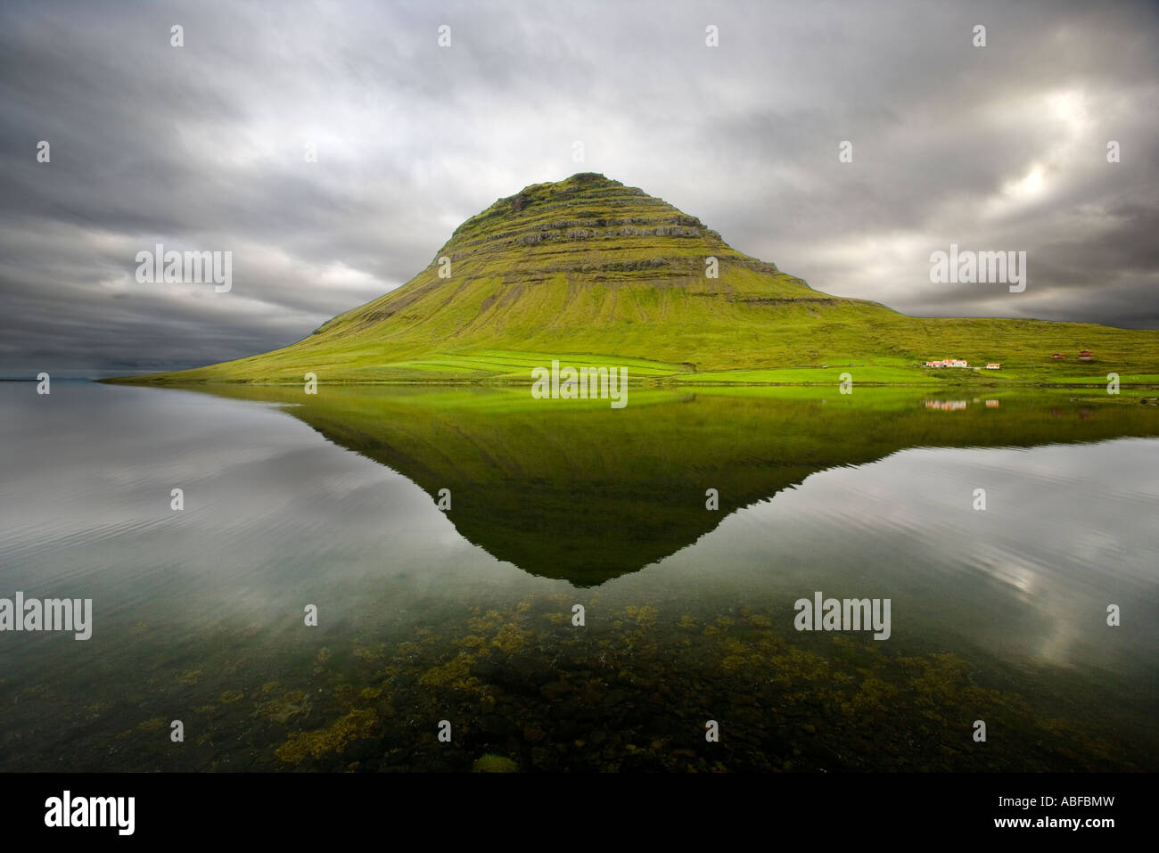 Green mountain in a bay on the northern edge of the Snæfellsnes Stock Photo