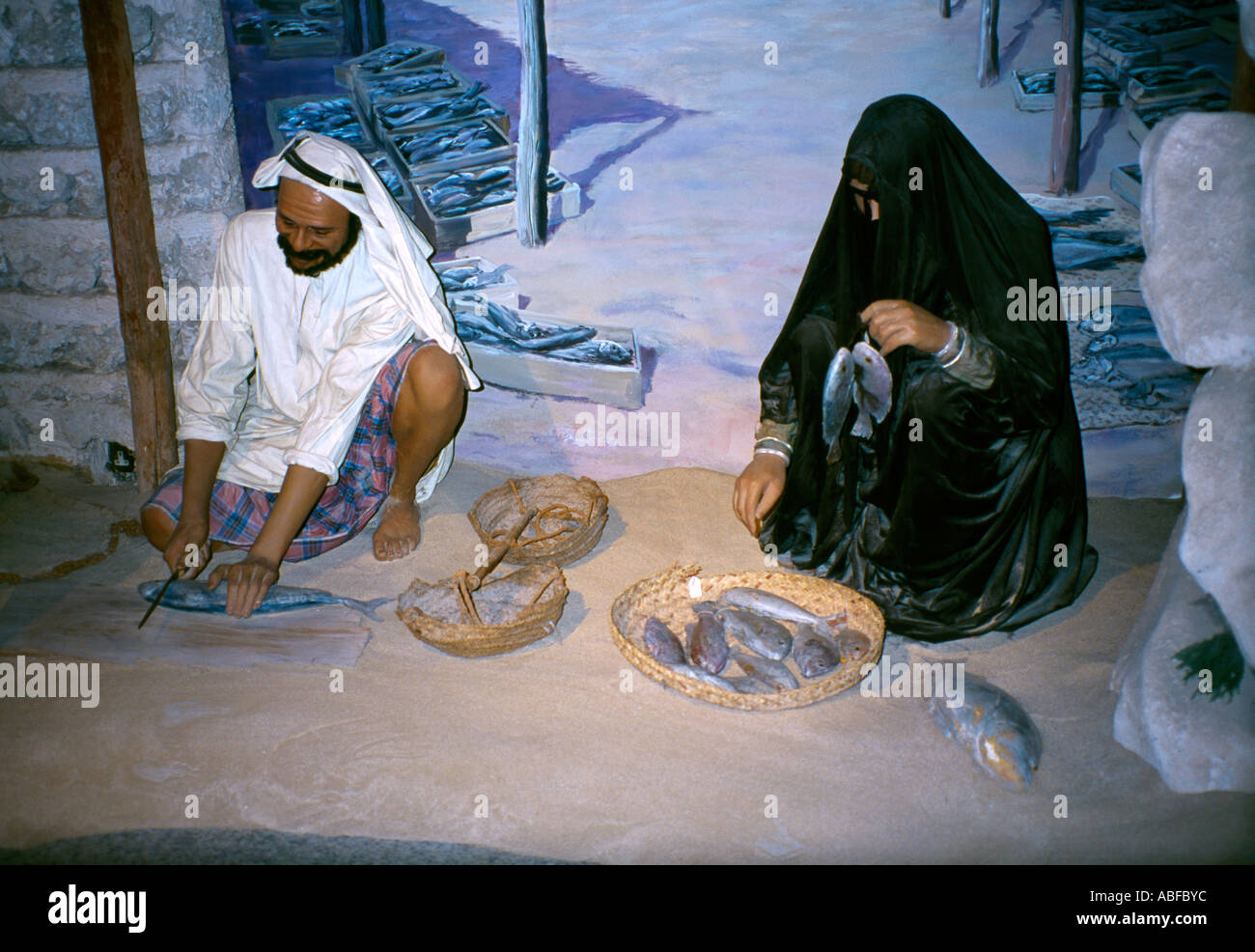 Dubai UAE Dubai Museum History Of UAE Man and Woman Preparing Fish