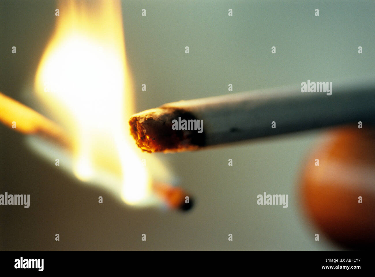 Lighting a Cigarette Stock Photo Alamy