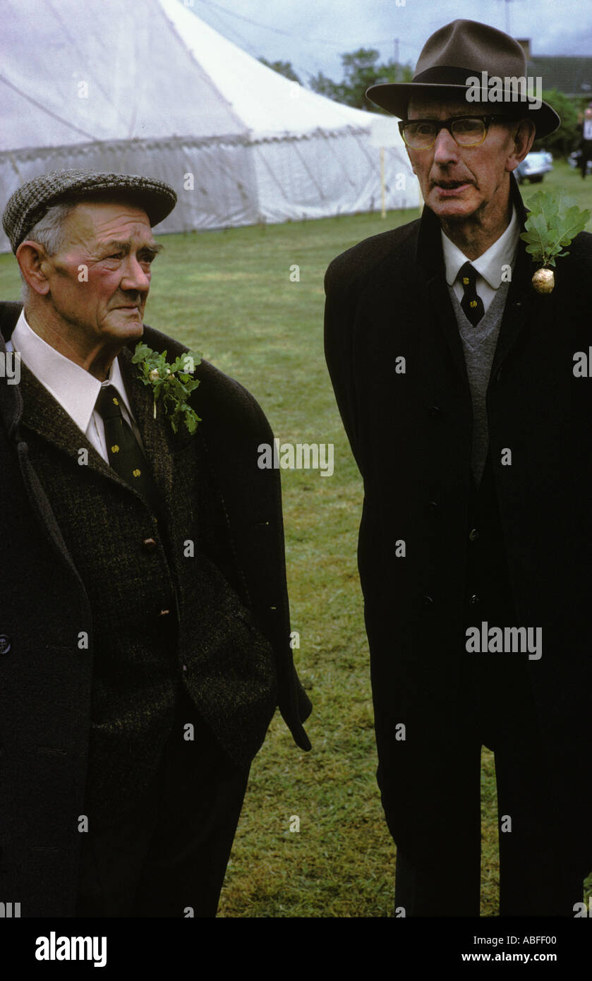 Oak Apple Day May 29th village committee members wearing oak apple at Grovely Forest Rights, Great Wishford Wiltshire 1970s UK HOMER SYKES Stock Photo