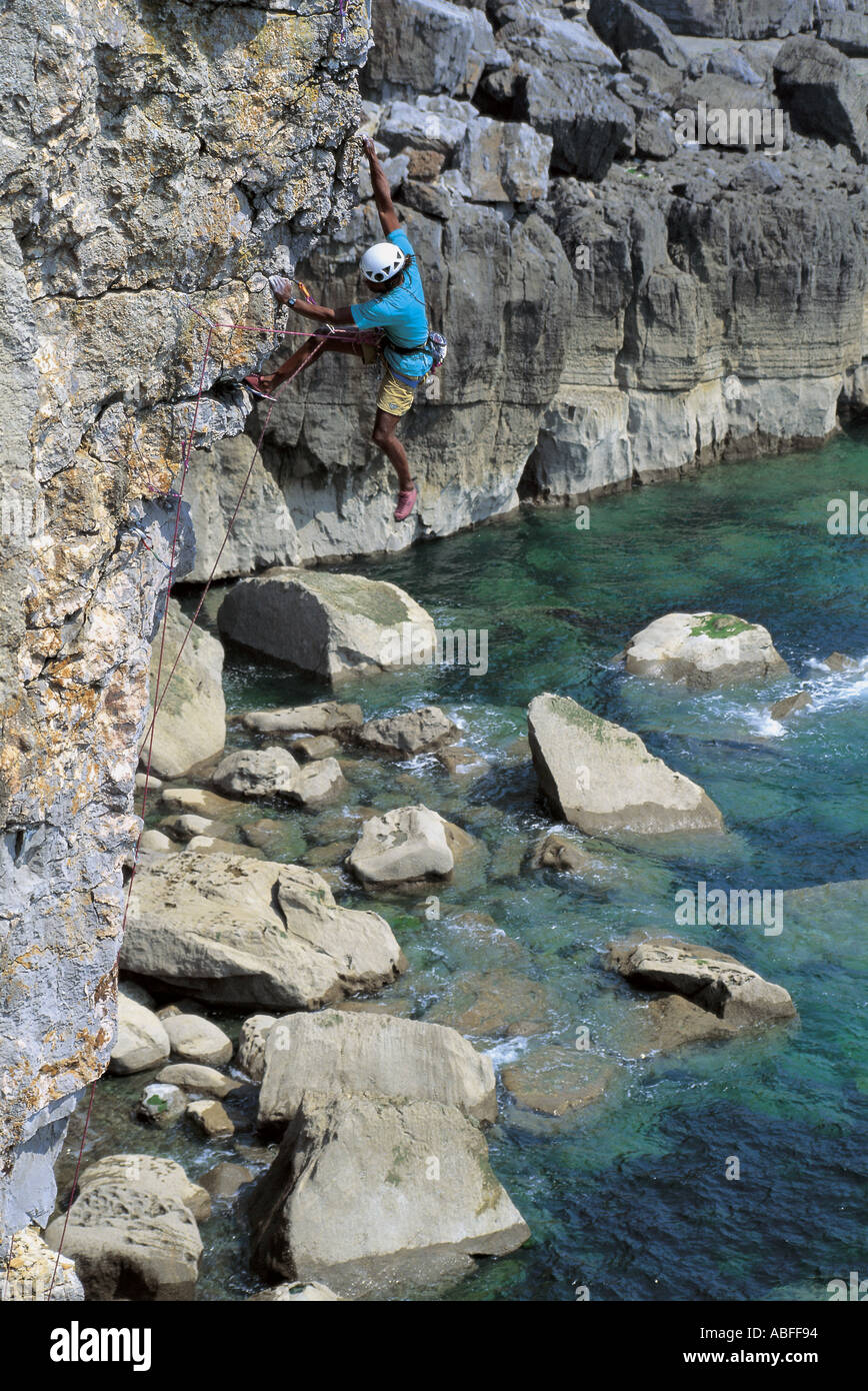 A climber in Pembroke Stock Photo