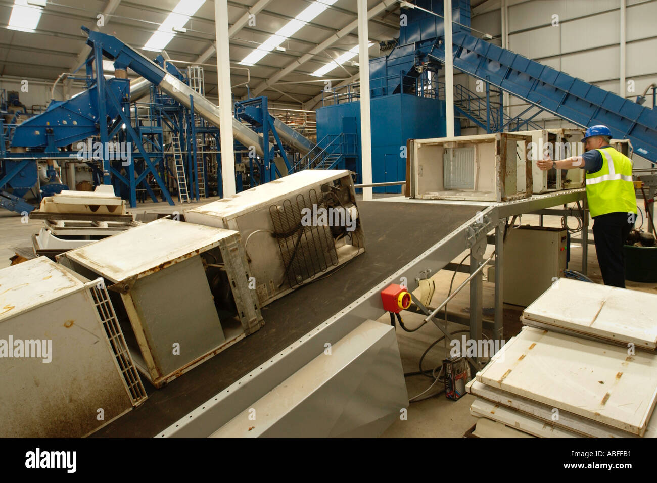 Fridges for recycling at SimsMetal UK Ltd in Newport Docks South Wales Fridge shredder in background Gwent UK GB Stock Photo