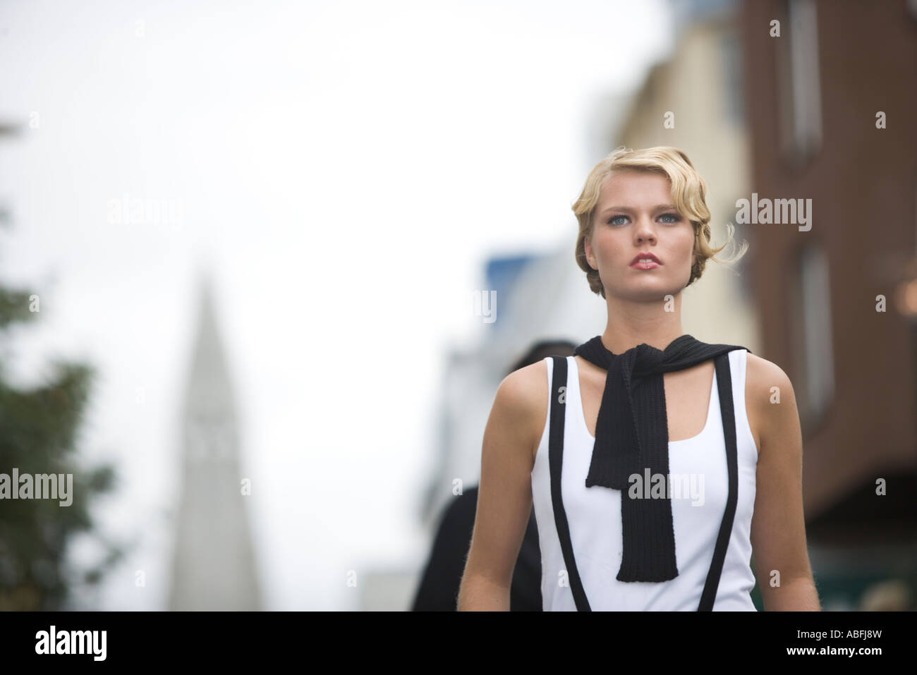 Blonde runway model and Hallgrimur's Church Stock Photo