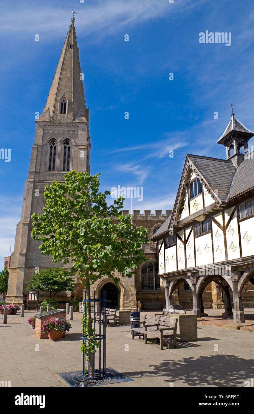 St Dionysius Parish church and the old half timbered grammar school in the deserted town centre of Market Harborough Leicestershire UK Stock Photo