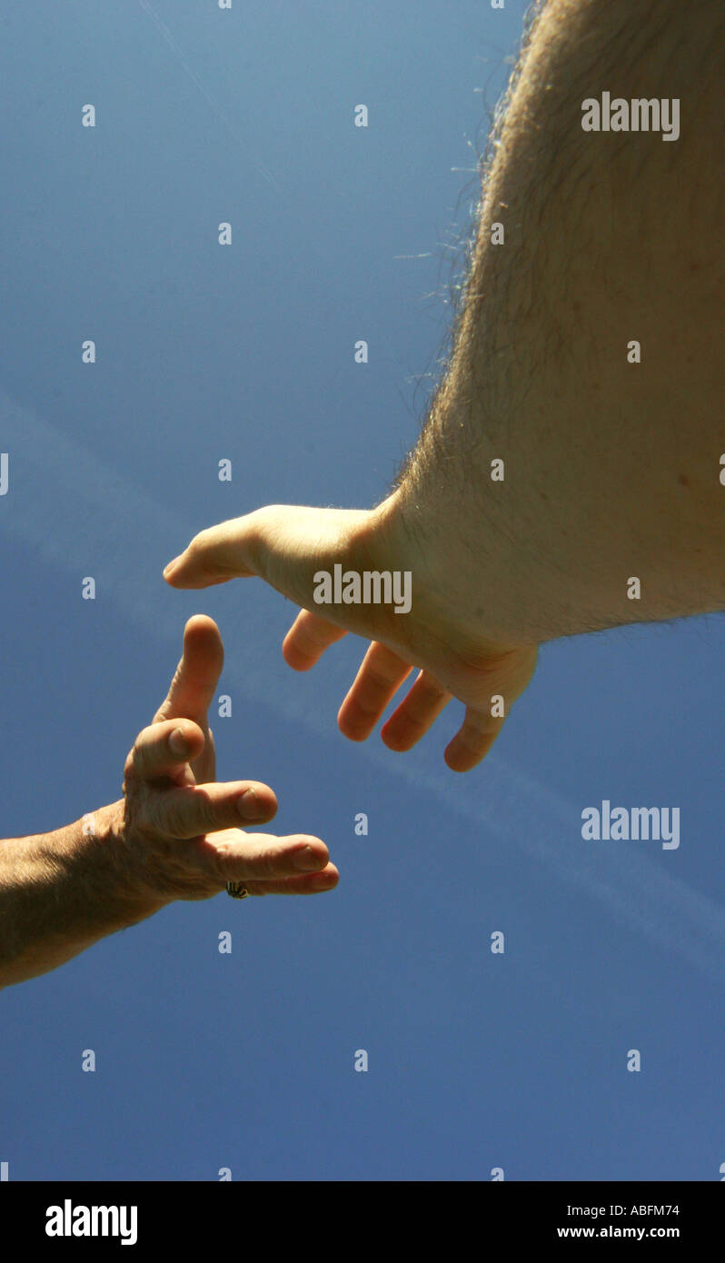 Hands reach out hi-res stock photography and images - Alamy