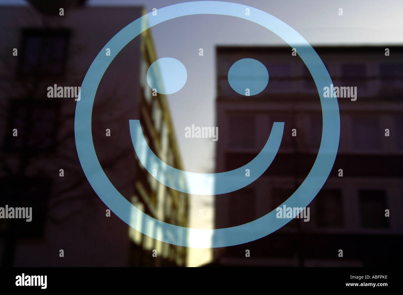 smiley face smile arty art discount shop window consumerism red glass reduction sales sale