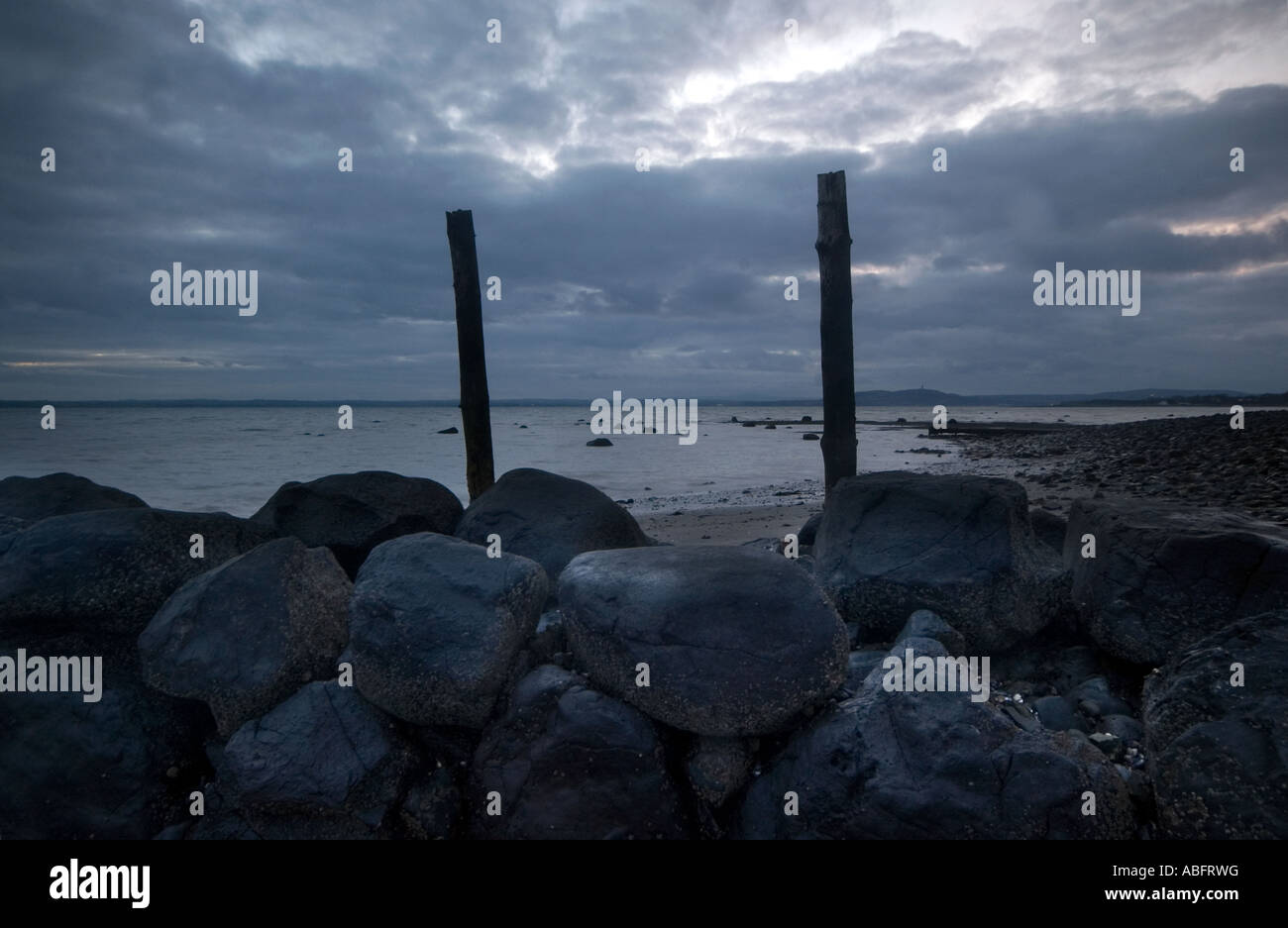Wooden posts along the County Down coast, Northern Ireland Stock Photo Alamy