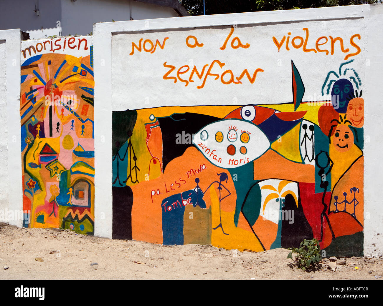 Graffiti with a serious message about violence to Mauritian children - Mauritius Stock Photo