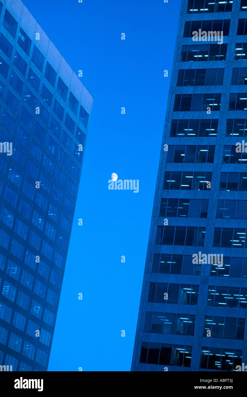 intrigue full moon clouds dark blue sky sinister solitude tranquil calm soothing Stock Photo