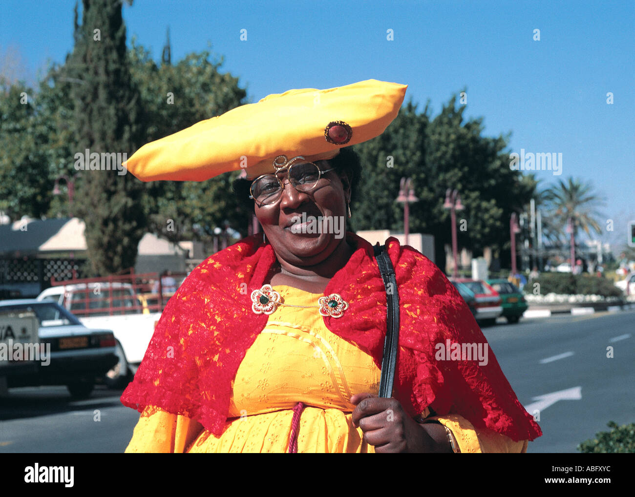 Herero lady in traditional dress on Independence Avenue Windhoek Namibia south west Africa Stock Photo