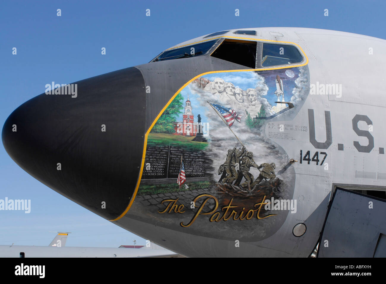 An aging Iowa Air National Guard KC-135 Stratotanker, displaying patriotic nose art, is about to retire. Stock Photo