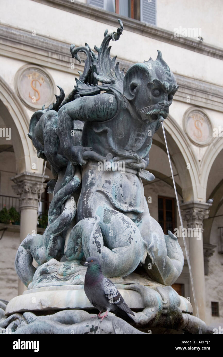 Triton fountain on Piazza SS Annunziata in front of Galleria dello Spedale degli Innocenti, Florence, Tuscany, Italy, Europe. Stock Photo