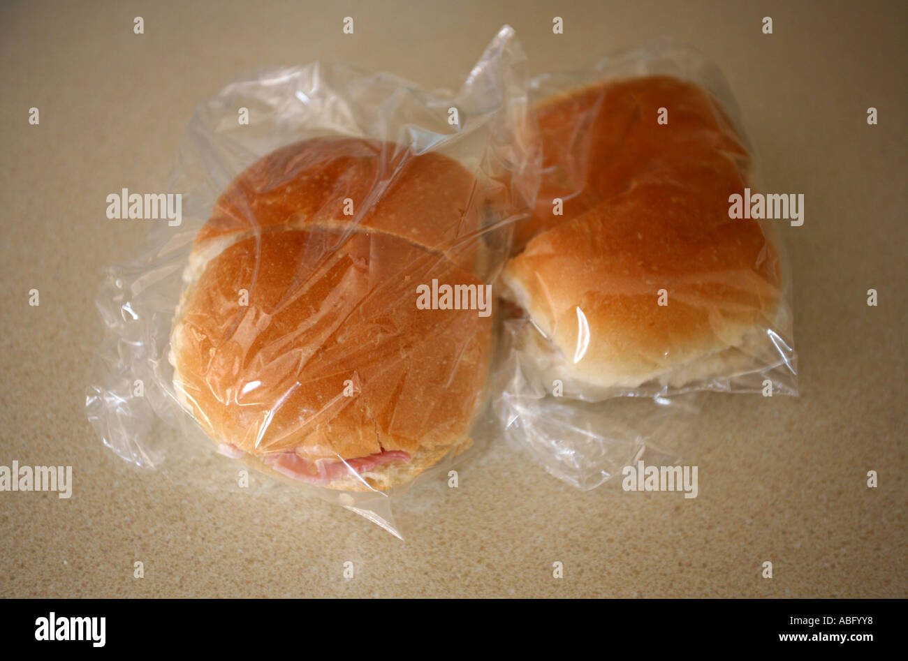 Bread rolls packed in plastic bags Stock Photo Alamy