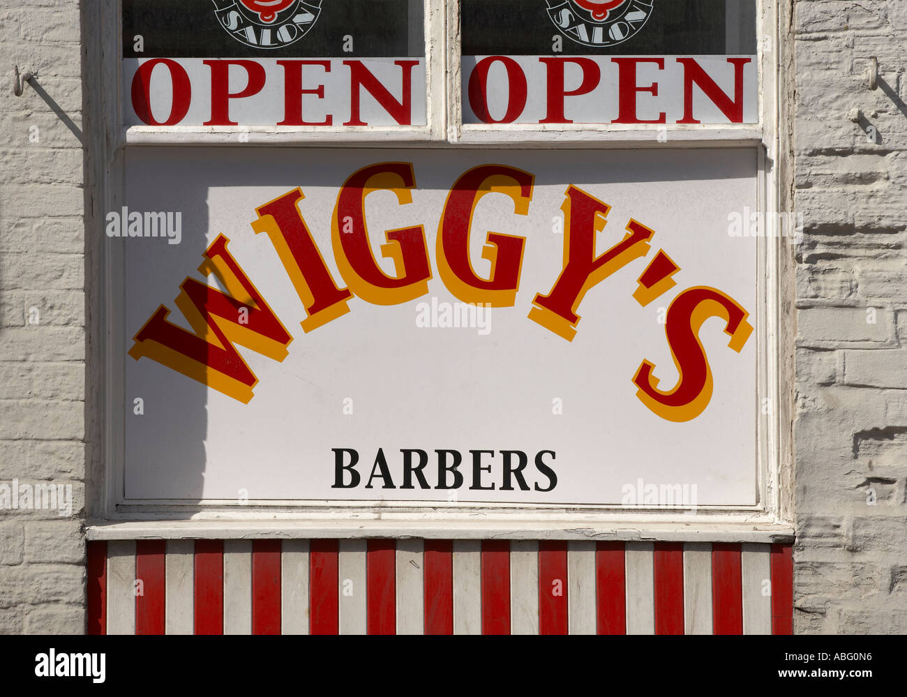 WIGGYS BARBERS SHOP FRONT WINDOW AND SIGN Stock Photo