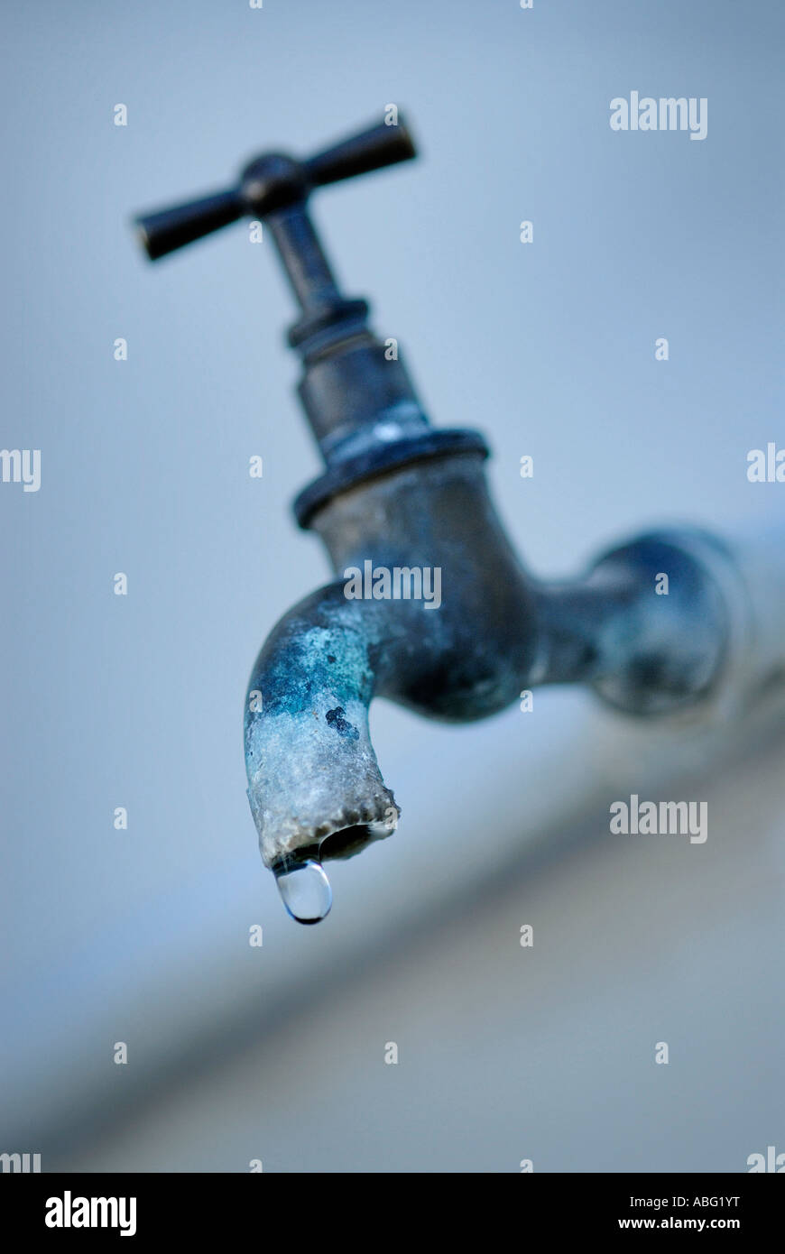 WATER DRIPPING FROM FAUCET Stock Photo Alamy