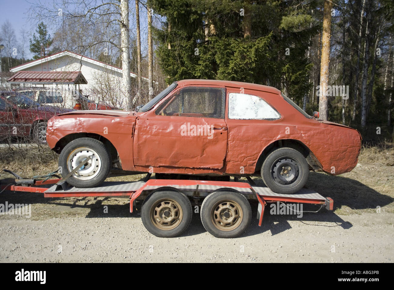 Red rallye car on trailer Stock Photo - Alamy