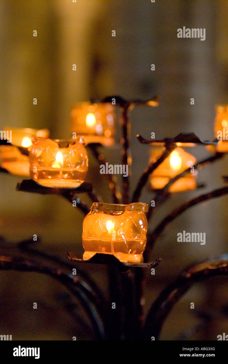 images of candles in churches in which a prayer is made and a candle lit to think about loved