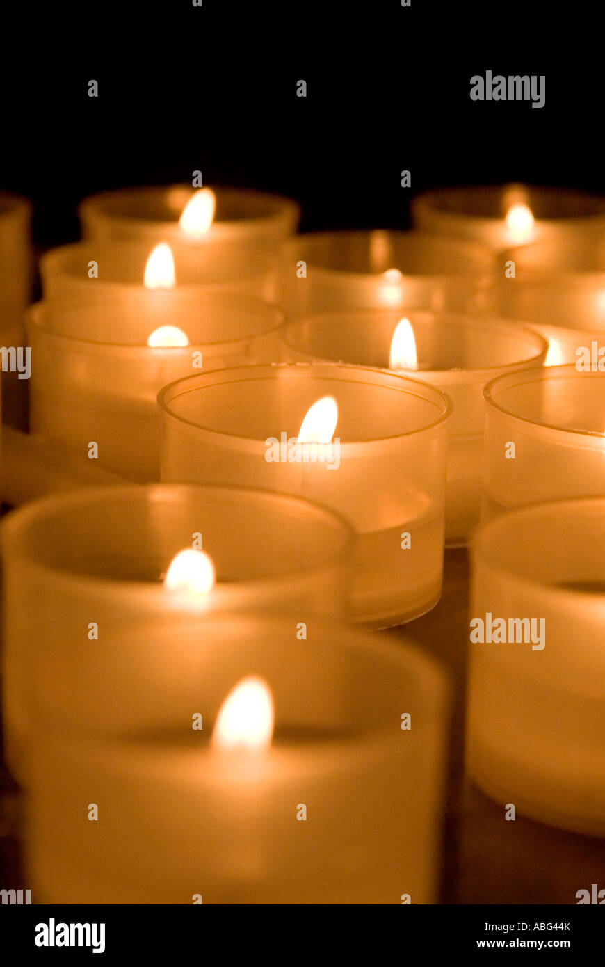 images of candles in churches in which a prayer is made and a candle lit to think about loved