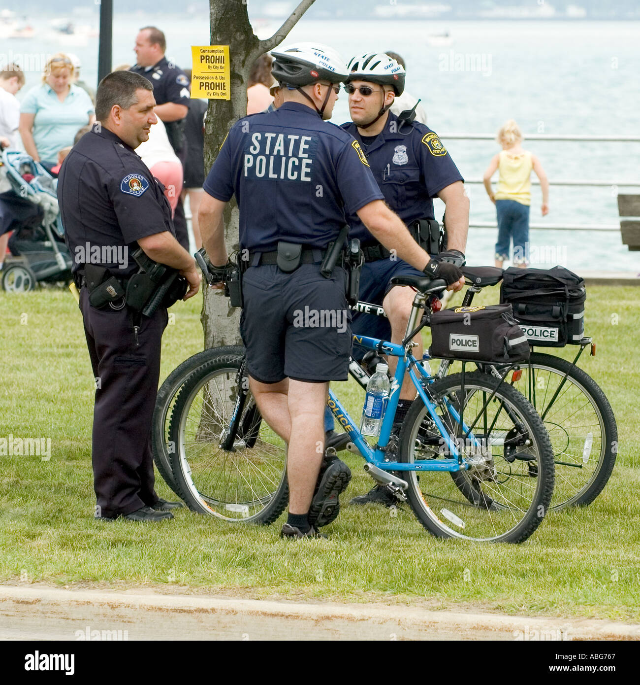 Police patrol a public event on bicycles Stock Photo