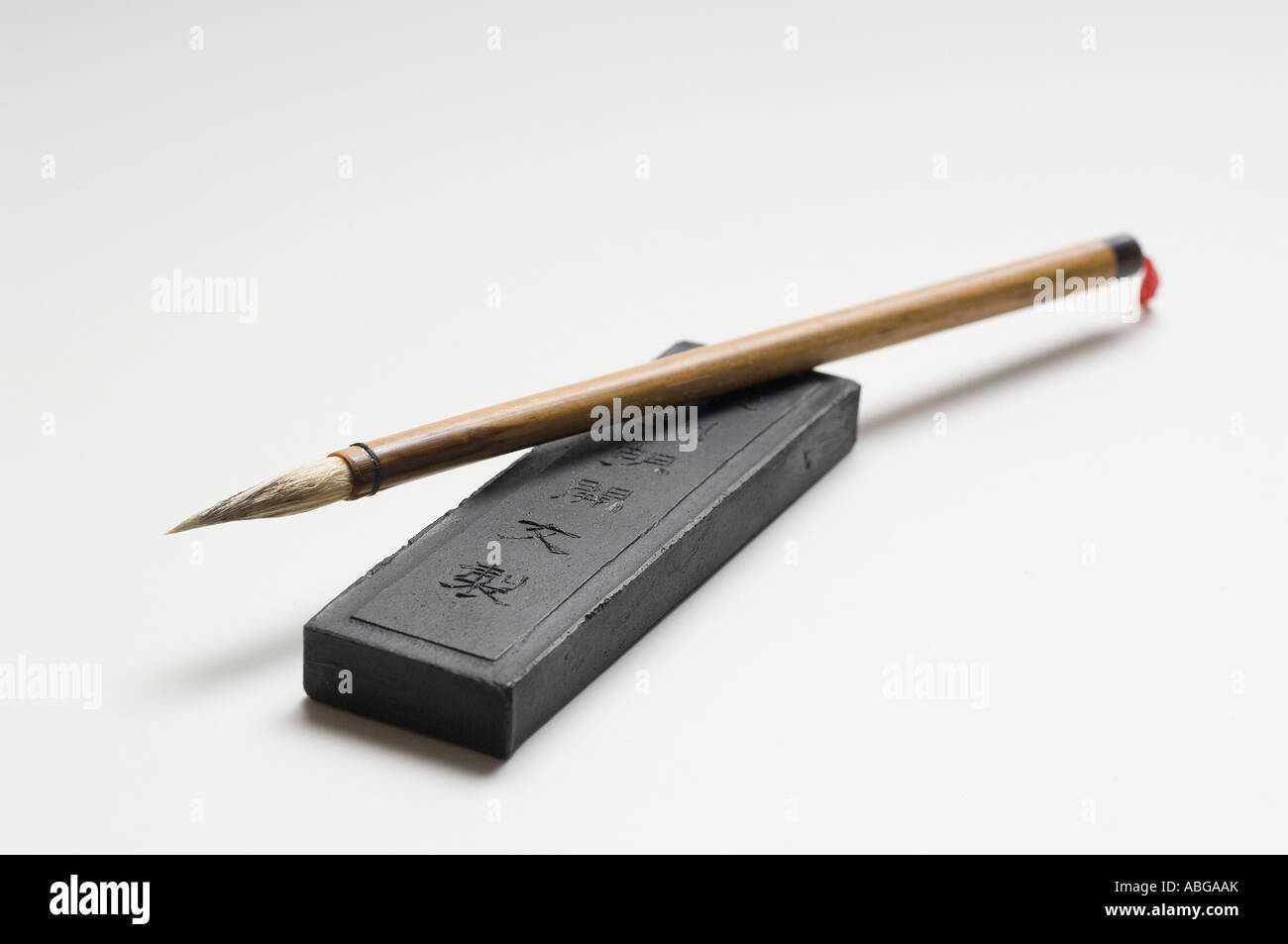Inkstone for producing Chinese ink and calligraphy brush Stock Photo