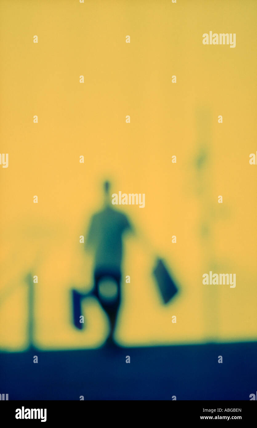 BUSINESS MAN WITH BRIEFCASE SILHOUETTED Stock Photo - Alamy
