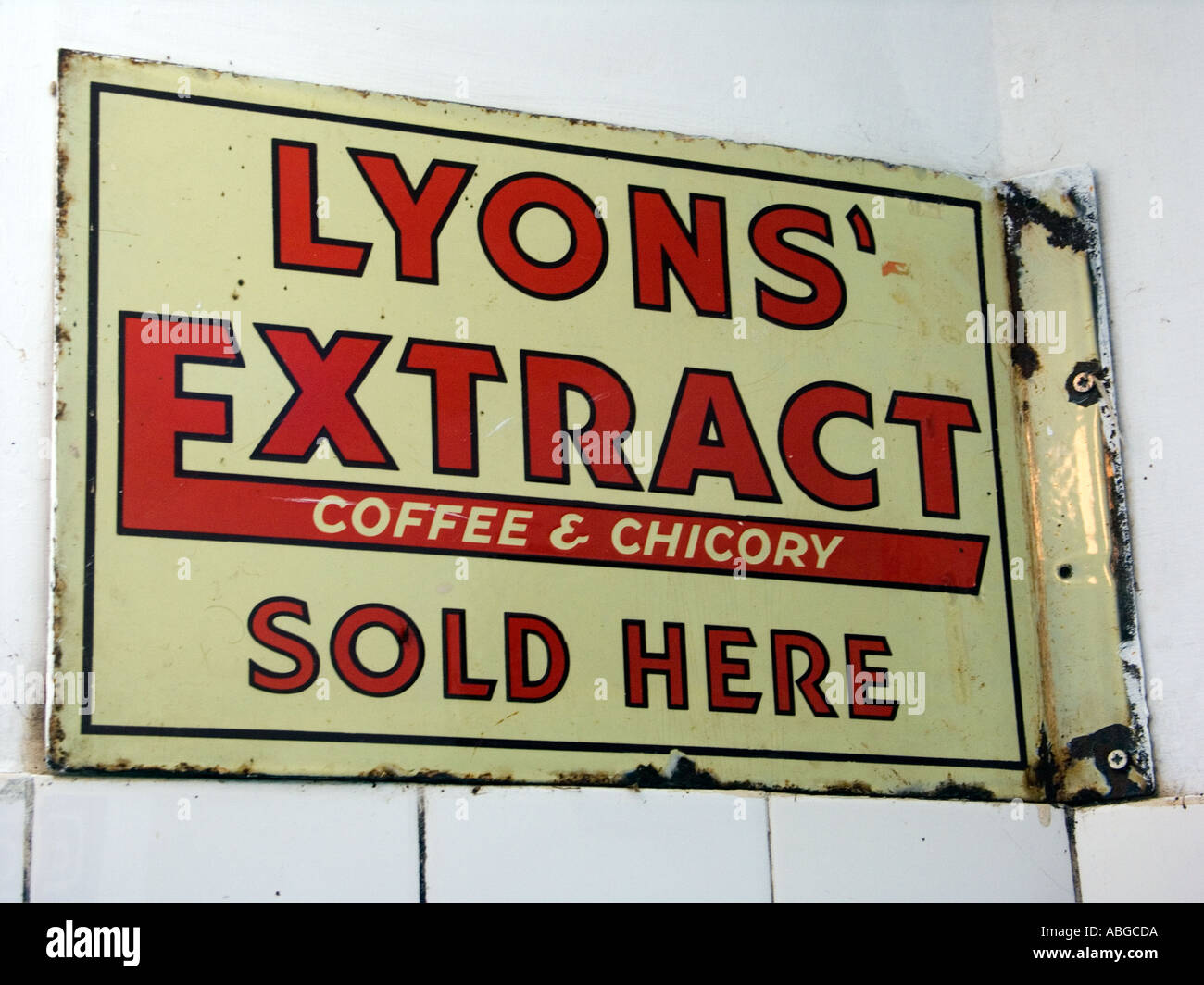 Rusty Old Lyons Coffee and Chicory Extract Sold Here advertising metal