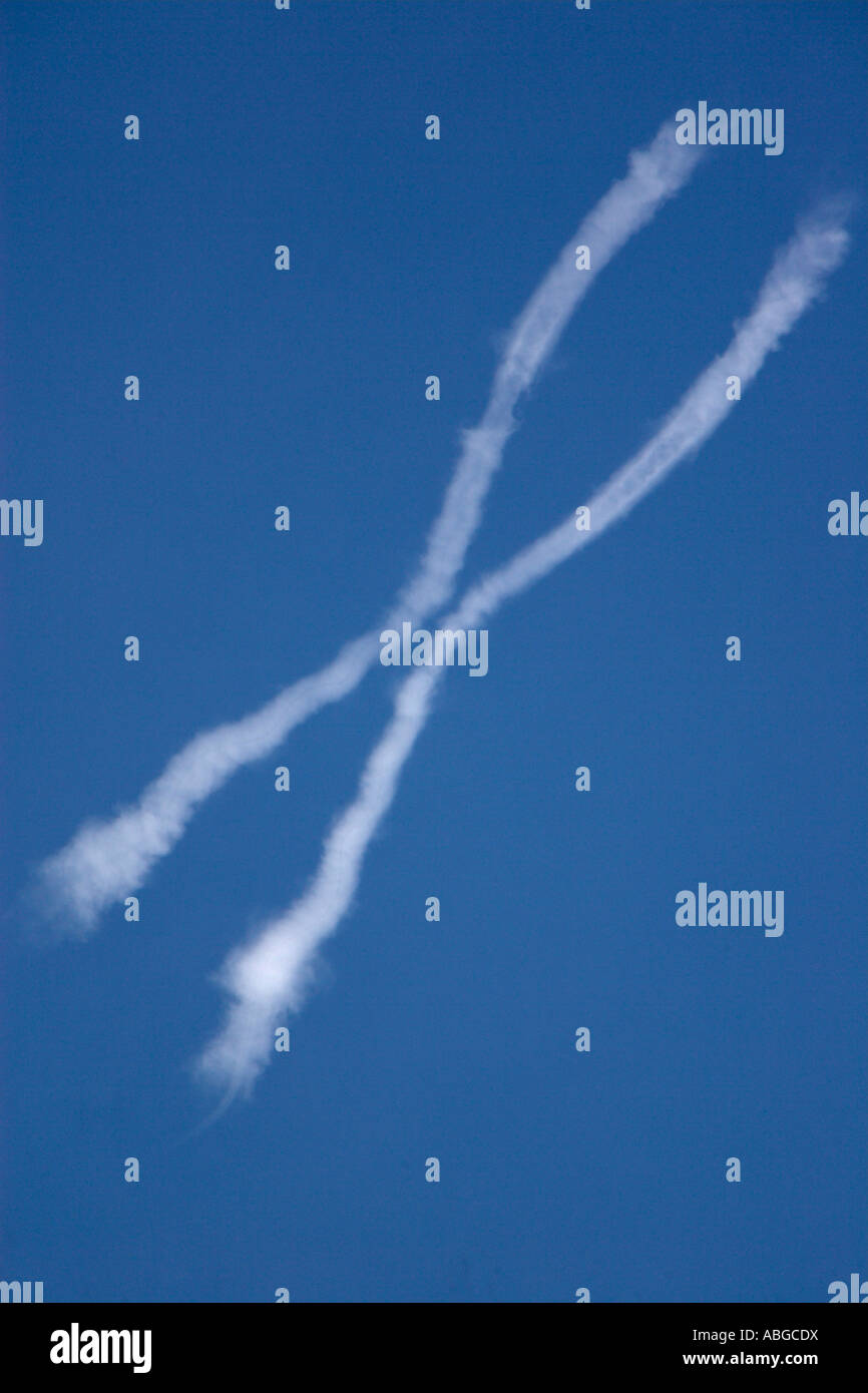 Vapour trails in the sky Stock Photo