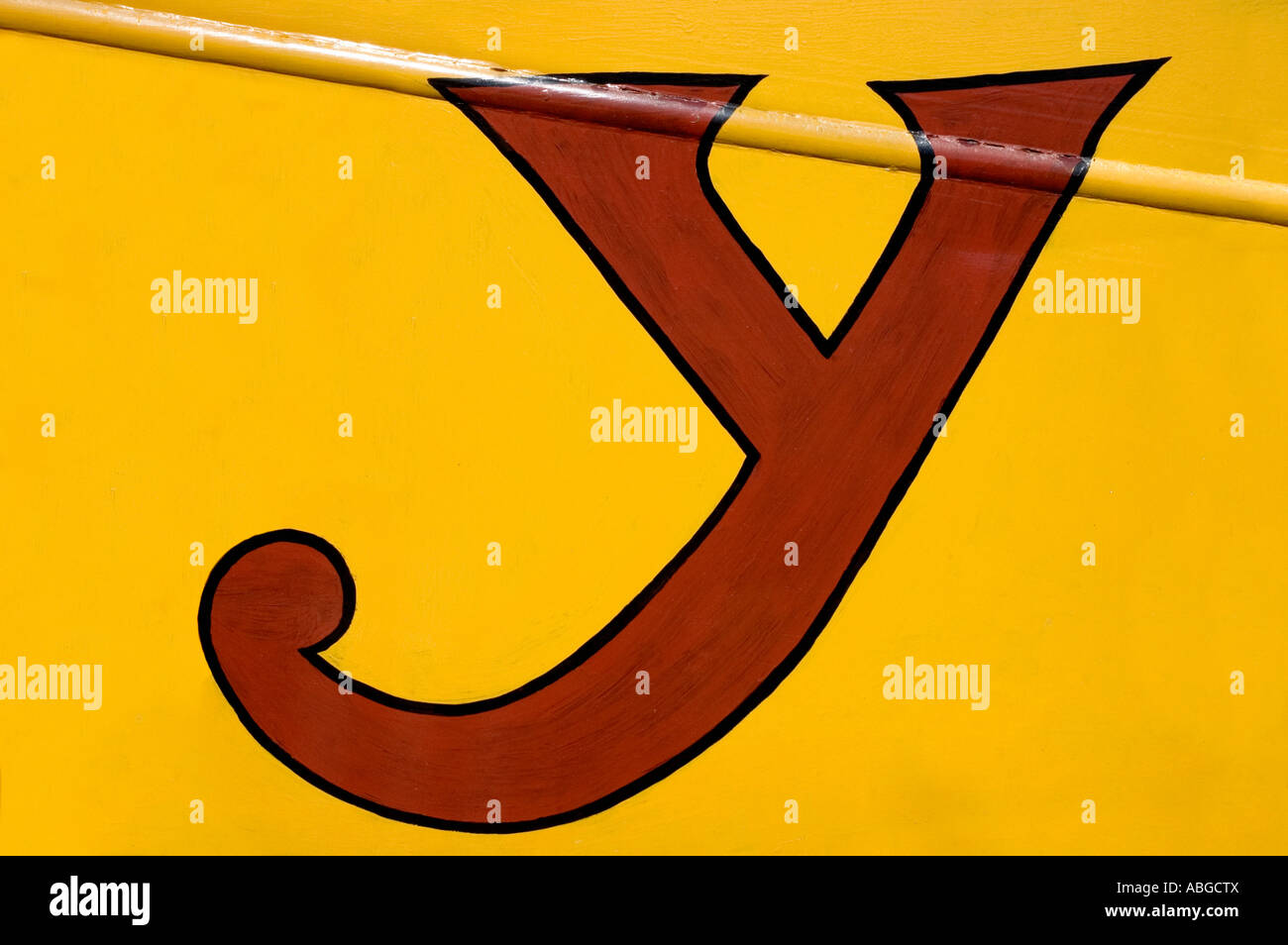 ALPHABET LETTER Y ON YELLOW BACKGROUND Stock Photo