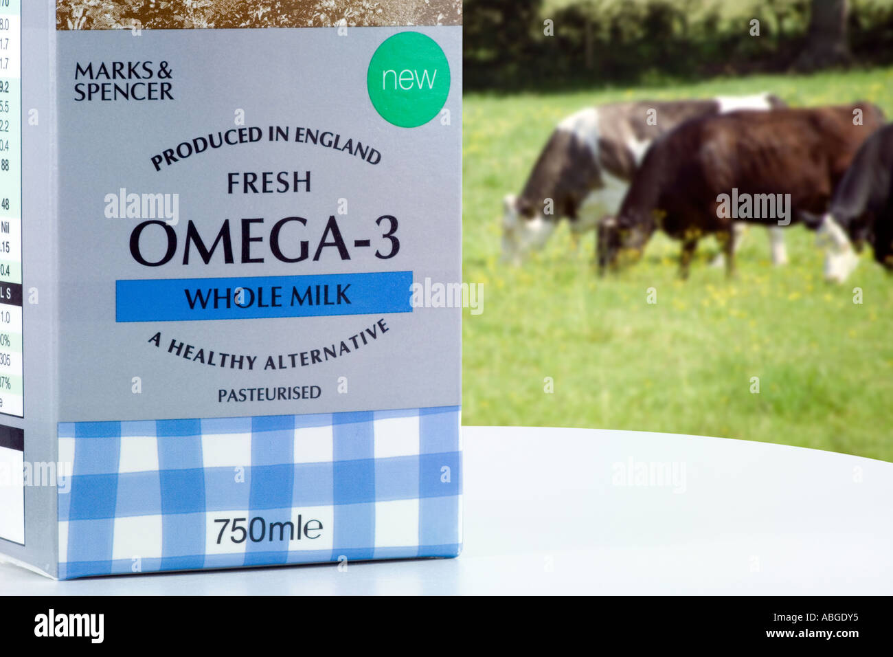 Carton of Milk fortified with omega3 fish oils with cows in Stock