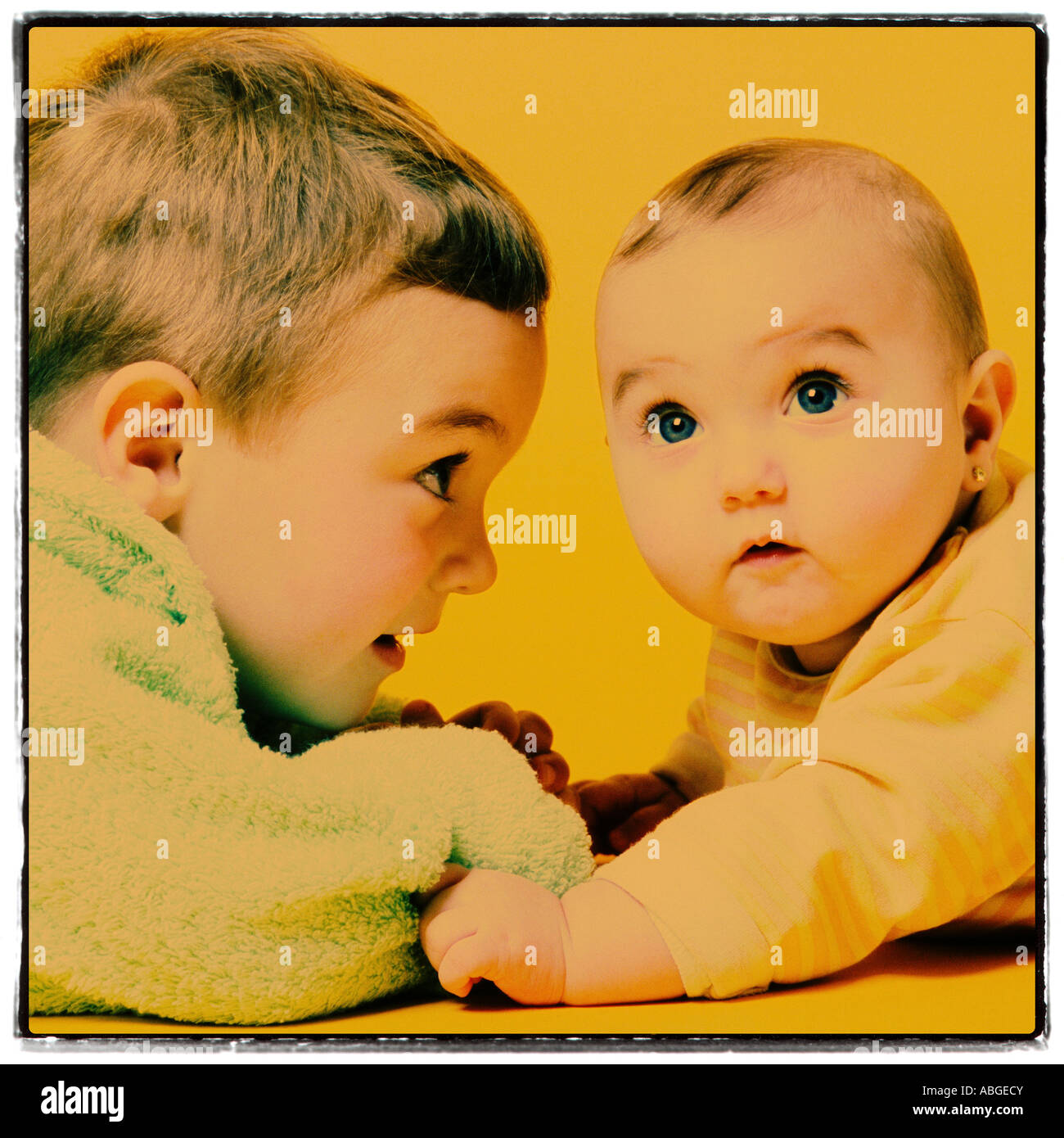 BOY AND BABY PLAYING TOGETHER Stock Photo Alamy