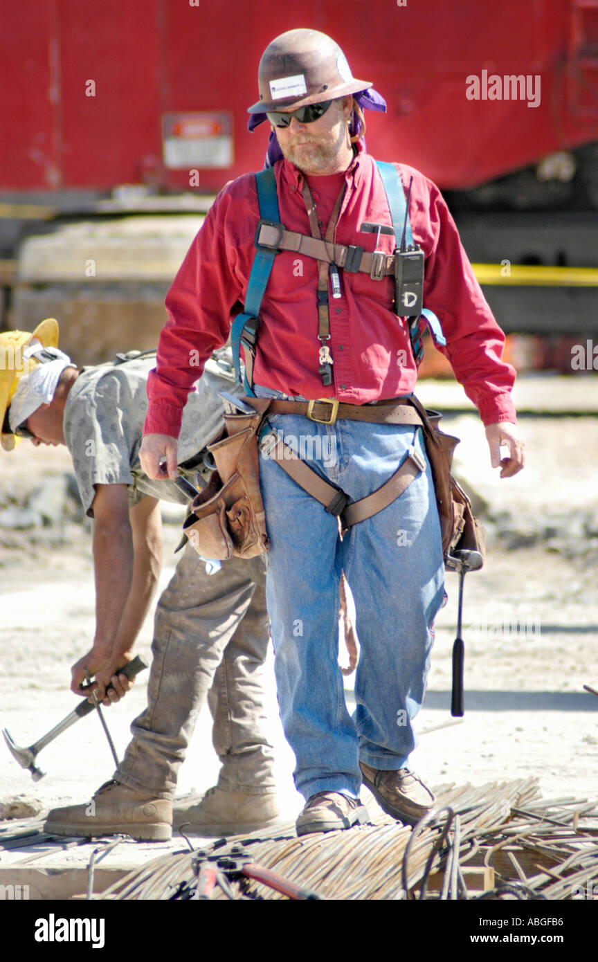 Major construction site in downtown Sarasota Florida Man in harness for