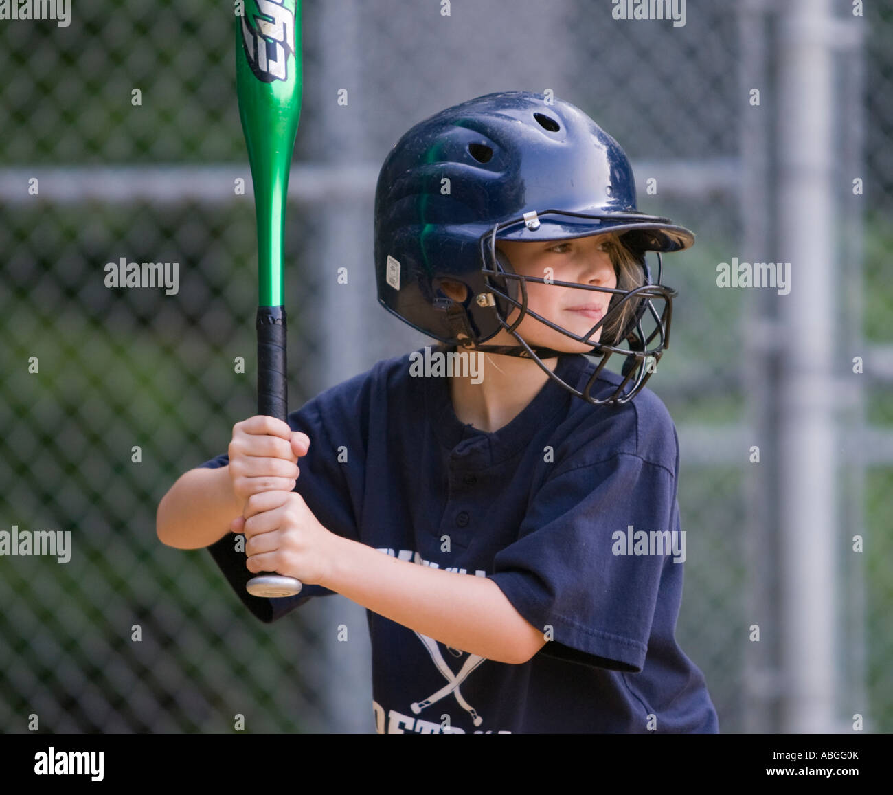 Girl getting ready to hit a softball Stock Photo Alamy
