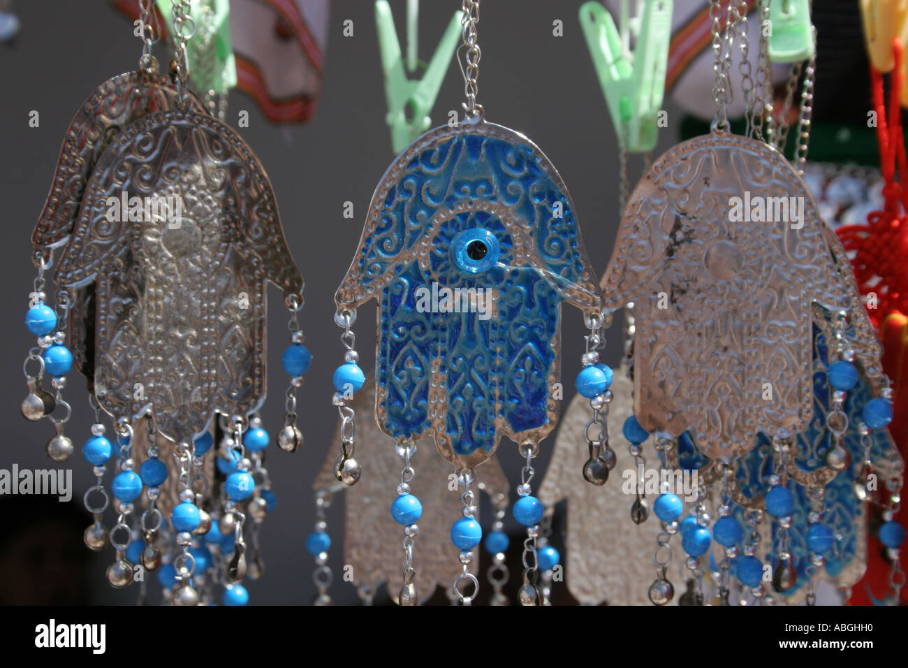 Hands of Fatima and evil eye jewellery on display Erriadh Hara Seghira Stock Photo