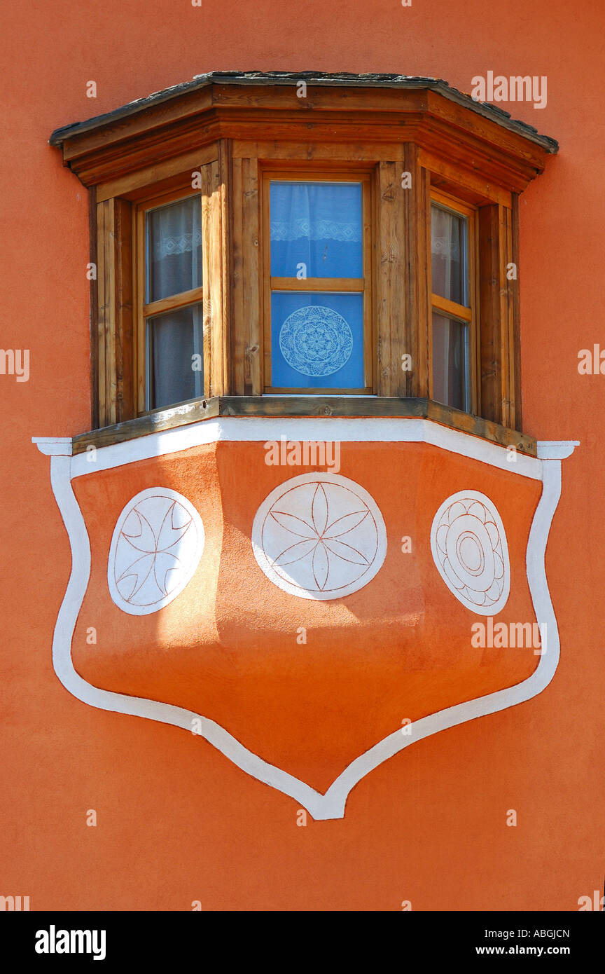 Bay window of traditional Engadine house, S-chanf, Engadin, Grisons, Switzerland Stock Photo
