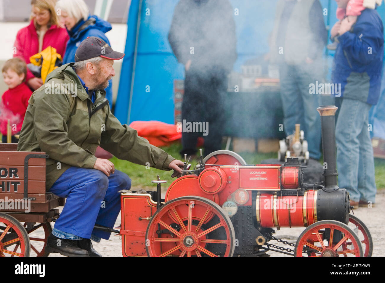 Man driving miniature steam traction engine Stock Photo