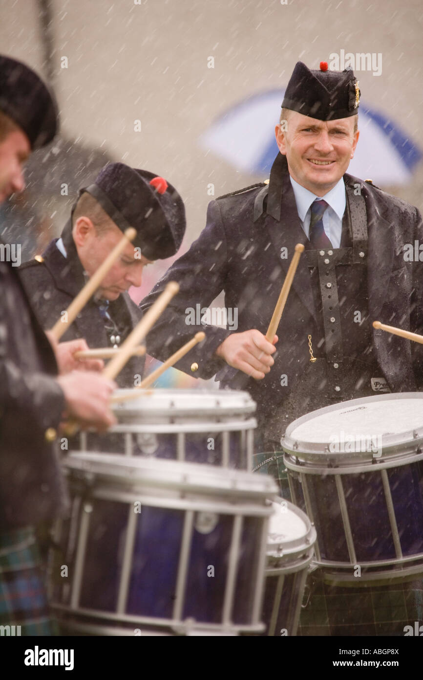 British summer time bad weather pipe band competition drummers druming