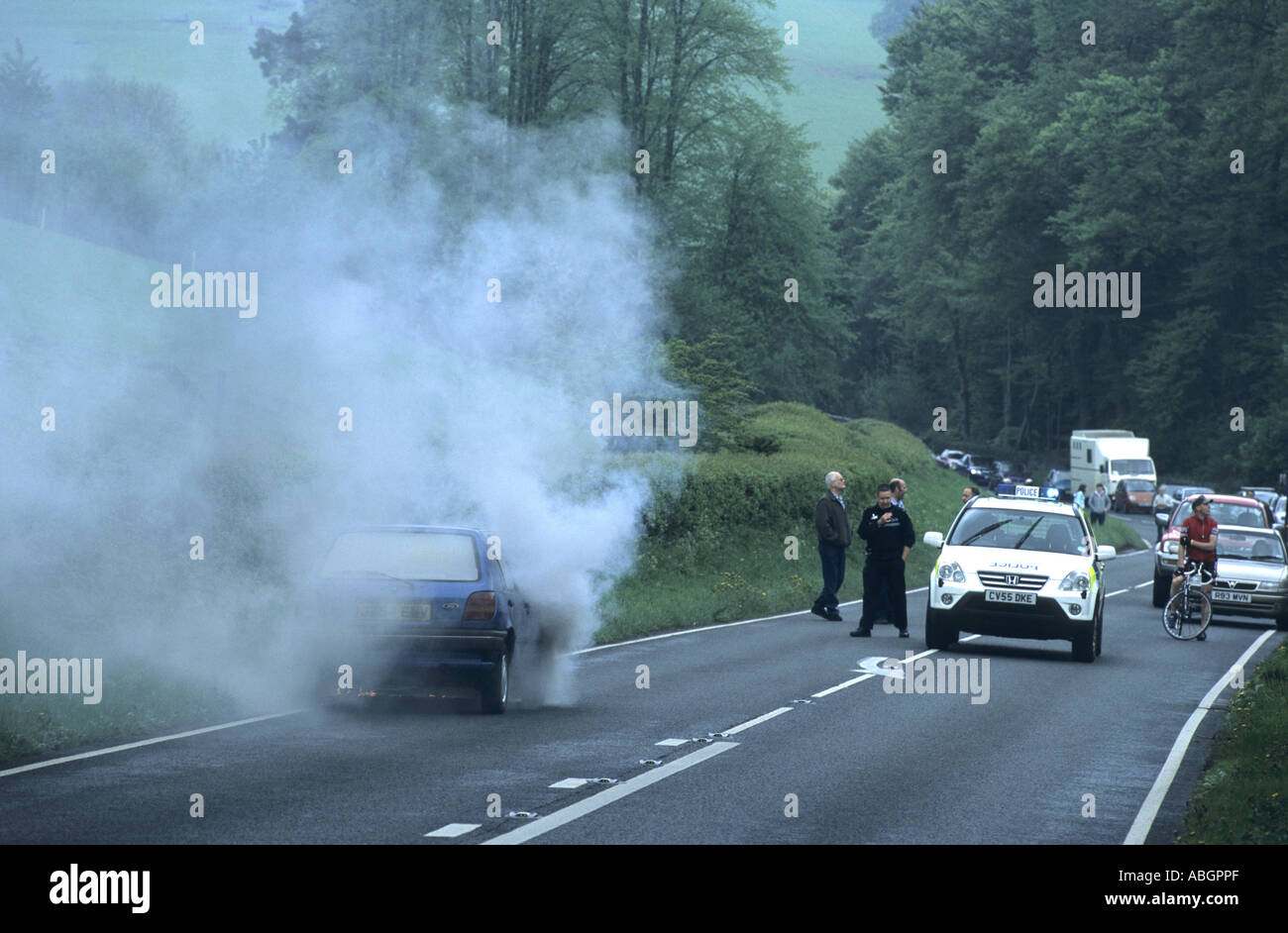 Car fire on A40 road, Powys, Wales, UK Stock Photo