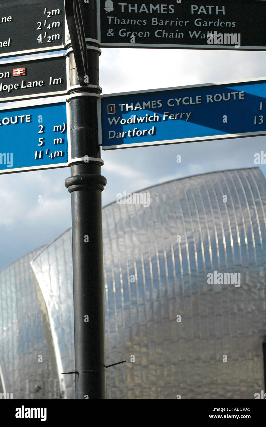 London Thames Barrier England with street sign showing directions in foregound Stock Photo