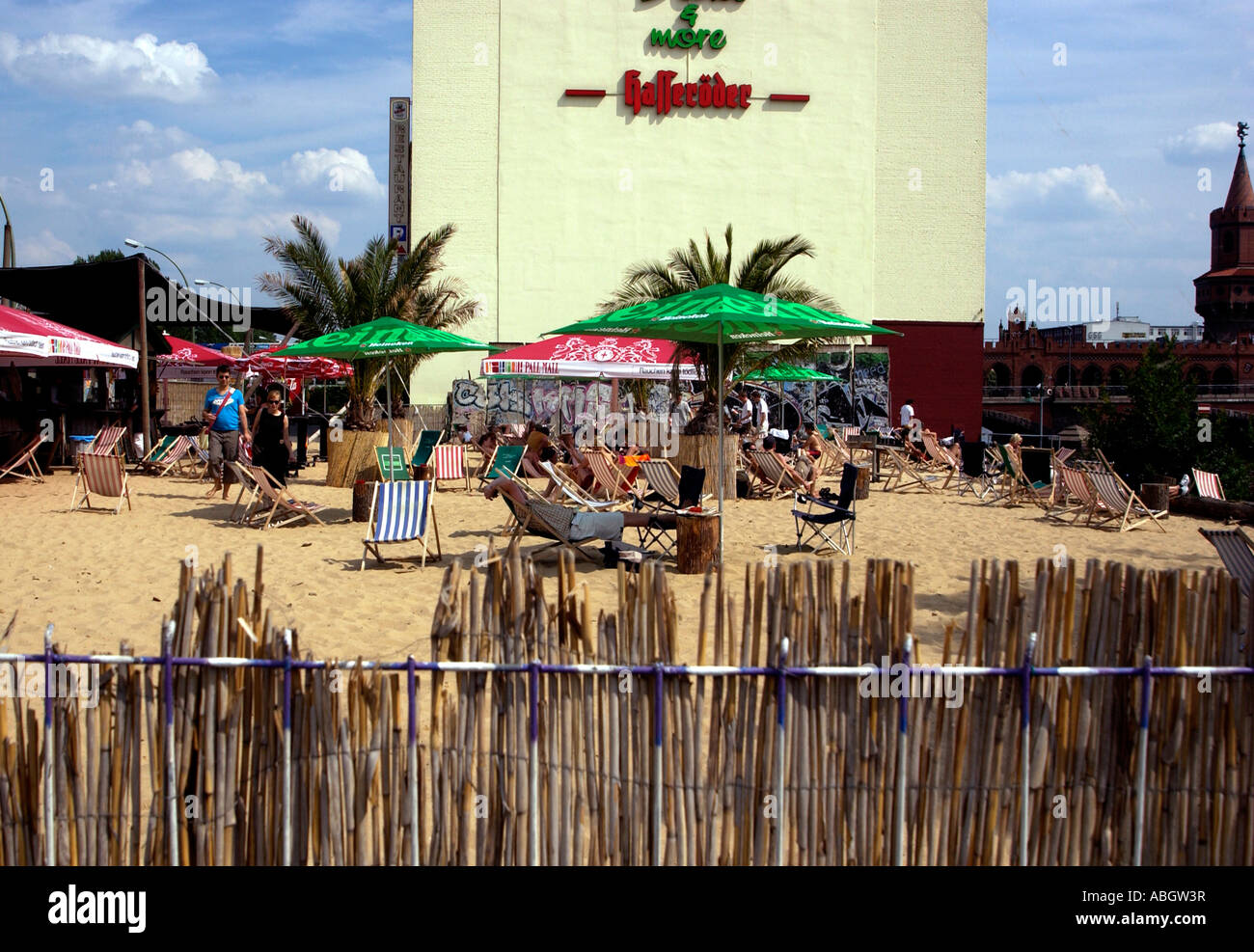 Locals and tourists enjoy outdoor beach bars in Berlin Germany Stock Photo