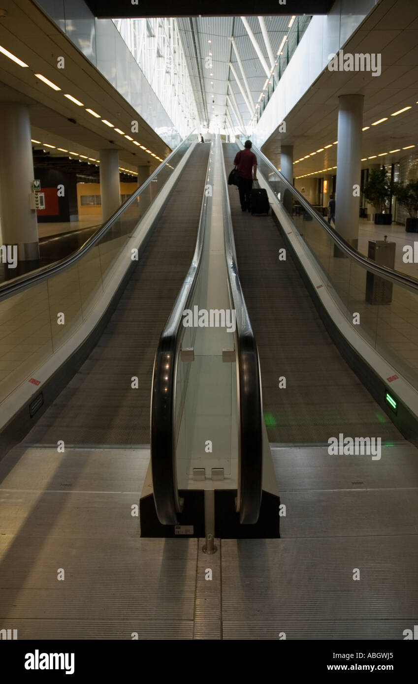 Escalator at Schipol airport Amsterdam Holland Stock Photo