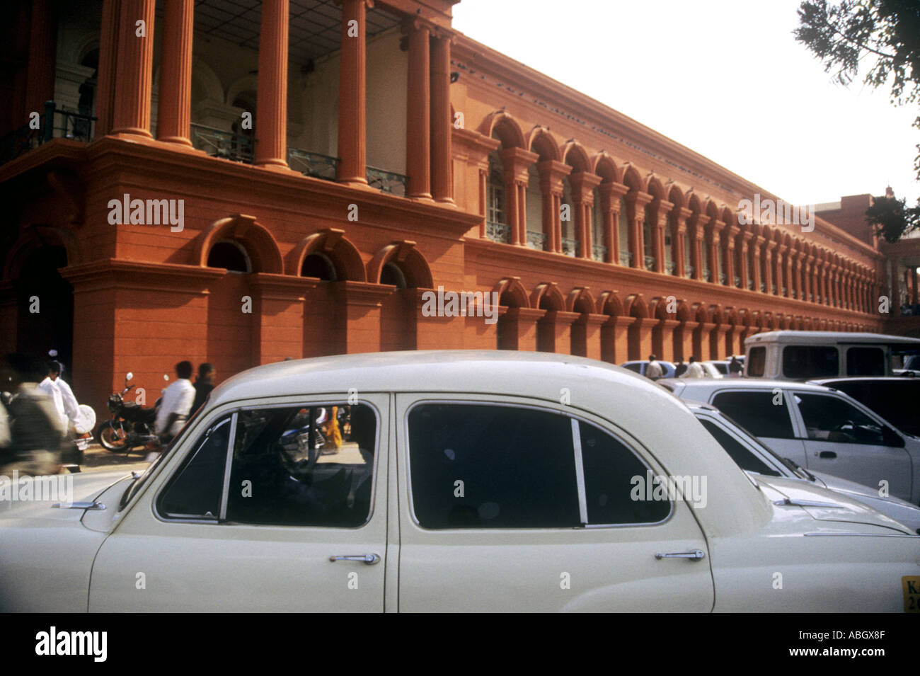 White HM Ambassador car parked outside government buildings in Bangalore Karnataka India Stock Photo