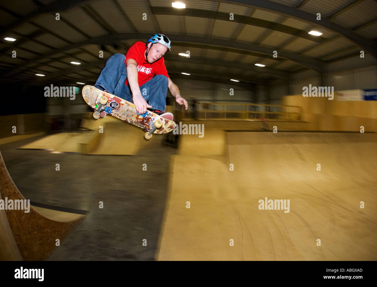 Skateboarder grab trick Stock Photo - Alamy