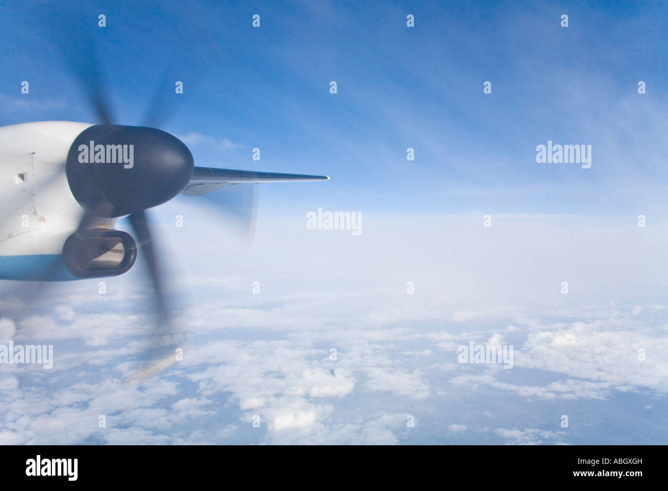 Propeller of aeroplane in flight with blue sky and light clouds Stock ...