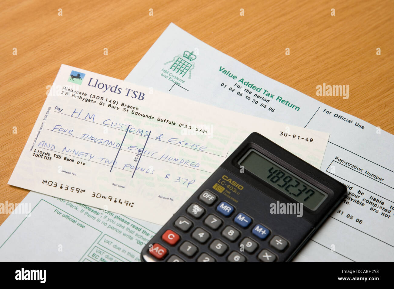 VAT return form, calculator and cheque made out to HM Customs & Excise  Stock Photo - Alamy